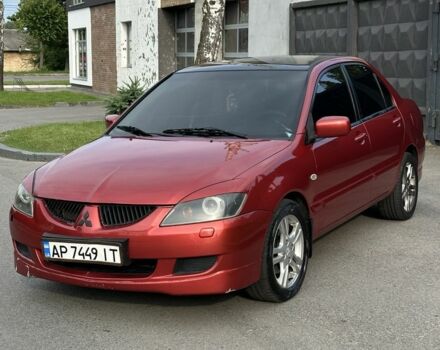 Червоний Міцубісі Lancer, об'ємом двигуна 1.6 л та пробігом 330 тис. км за 3250 $, фото 1 на Automoto.ua