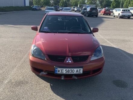 Мицубиси Лансер 2006 в Днепре (Днепропетровске) на Automoto.ua Красный Мицубиси Лансер, объемом двигателя 1.6 л и пробегом 490 тыс. км за 4000 $, фото 1 на Automoto.ua