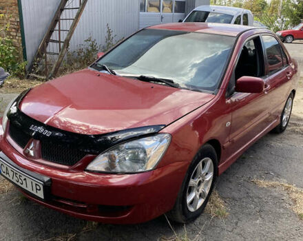 Червоний Міцубісі Lancer, об'ємом двигуна 1.58 л та пробігом 273 тис. км за 3650 $, фото 1 на Automoto.ua