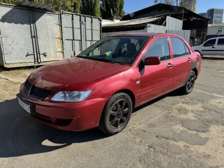 Мицубиси Лансер 2006 в Киеве на Automoto.ua Красный Мицубиси Лансер, объемом двигателя 1.3 л и пробегом 200 тыс. км за 2300 $, фото 1 на Automoto.ua