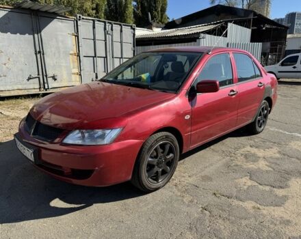 Червоний Міцубісі Lancer, об'ємом двигуна 1.3 л та пробігом 200 тис. км за 2300 $, фото 1 на Automoto.ua