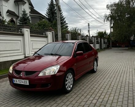 Червоний Міцубісі Lancer, об'ємом двигуна 1.6 л та пробігом 270 тис. км за 2200 $, фото 1 на Automoto.ua