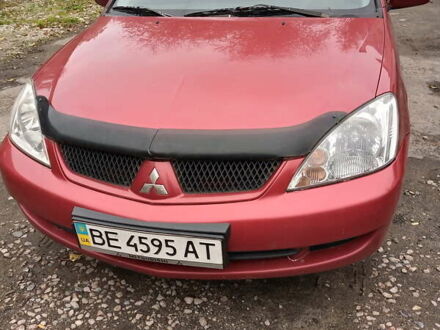 Міцубісі Lancer 2006 у Києві на Automoto.ua Червоний Міцубісі Lancer, об'ємом двигуна 0 л та пробігом 217 тис. км за 3750 $, фото 1 на Automoto.ua