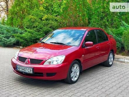 Мицубиси Лансер 2006 в Запорожье на Automoto.ua Красный Мицубиси Лансер, объемом двигателя 1.6 л и пробегом 220 тыс. км за 4950 $, фото 1 на Automoto.ua