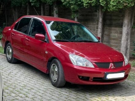 Мицубиси Лансер 2006 в Тернополе на Automoto.ua Красный Мицубиси Лансер, объемом двигателя 1.6 л и пробегом 108 тыс. км за 5400 $, фото 1 на Automoto.ua