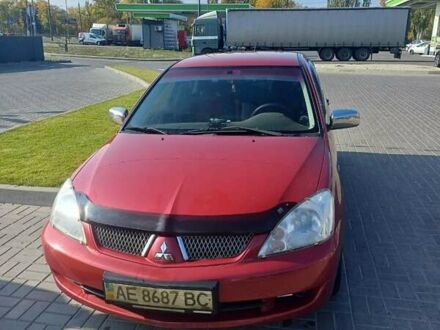 Червоний Міцубісі Lancer, об'ємом двигуна 1.6 л та пробігом 73 тис. км за 5500 $, фото 1 на Automoto.ua