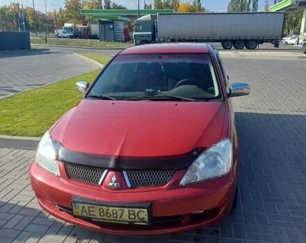 Красный Мицубиси Лансер, объемом двигателя 1.6 л и пробегом 73 тыс. км за 5500 $, фото 1 на Automoto.ua