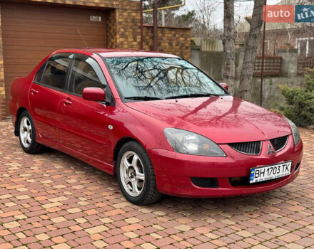 Червоний Міцубісі Lancer, об'ємом двигуна 1.58 л та пробігом 239 тис. км за 4100 $, фото 1 на Automoto.ua