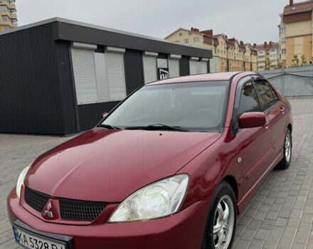Червоний Міцубісі Lancer, об'ємом двигуна 1.59 л та пробігом 193 тис. км за 5000 $, фото 1 на Automoto.ua