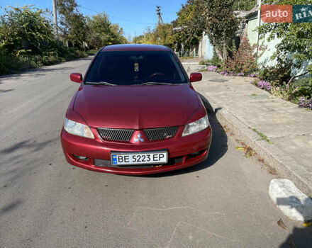 Красный Мицубиси Лансер, объемом двигателя 1.58 л и пробегом 290 тыс. км за 4350 $, фото 1 на Automoto.ua