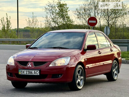 Червоний Міцубісі Lancer, об'ємом двигуна 1.6 л та пробігом 143 тис. км за 6300 $, фото 1 на Automoto.ua