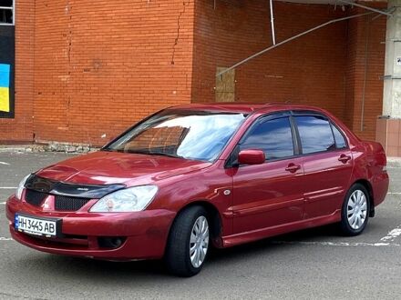 Червоний Міцубісі Lancer, об'ємом двигуна 1.6 л та пробігом 1 тис. км за 3990 $, фото 1 на Automoto.ua