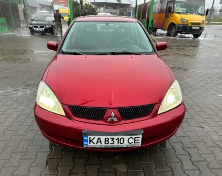 Червоний Міцубісі Lancer, об'ємом двигуна 1.6 л та пробігом 185 тис. км за 5000 $, фото 1 на Automoto.ua
