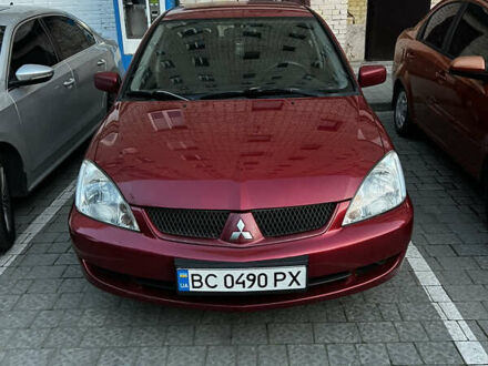 Красный Мицубиси Лансер, объемом двигателя 1.6 л и пробегом 312 тыс. км за 4600 $, фото 1 на Automoto.ua