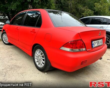 Червоний Міцубісі Lancer, об'ємом двигуна 1.6 л та пробігом 283 тис. км за 3500 $, фото 1 на Automoto.ua