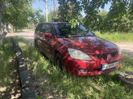 Мицубиси Лансер 2006 в Кривом Роге на Automoto.ua Красный Мицубиси Лансер, объемом двигателя 1.6 л и пробегом 240 тыс. км за 2500 $, фото 1 на Automoto.ua
