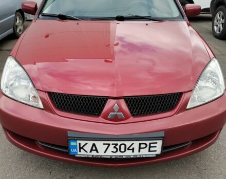 Червоний Міцубісі Lancer, об'ємом двигуна 1.6 л та пробігом 273 тис. км за 3641 $, фото 1 на Automoto.ua