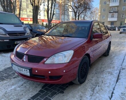 Красный Мицубиси Лансер, объемом двигателя 1.6 л и пробегом 289 тыс. км за 3350 $, фото 1 на Automoto.ua