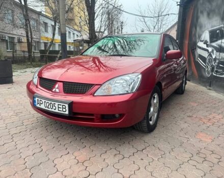 Червоний Міцубісі Lancer, об'ємом двигуна 1.6 л та пробігом 276 тис. км за 4350 $, фото 1 на Automoto.ua