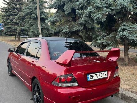 Мицубиси Лансер 2006 в Николаеве на Automoto.ua Красный Мицубиси Лансер, объемом двигателя 2 л и пробегом 307 тыс. км за 4500 $, фото 1 на Automoto.ua