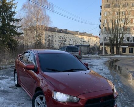 Красный Мицубиси Лансер, объемом двигателя 2 л и пробегом 320 тыс. км за 6300 $, фото 1 на Automoto.ua