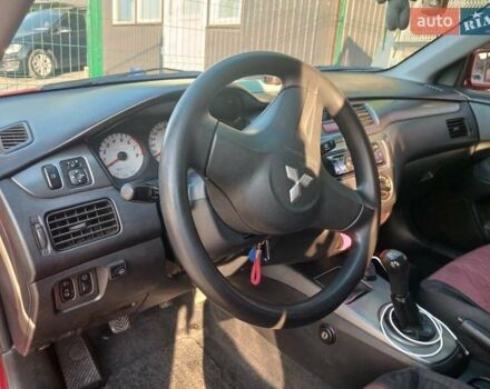 Червоний Міцубісі Lancer, об'ємом двигуна 1.58 л та пробігом 311 тис. км за 3550 $, фото 1 на Automoto.ua