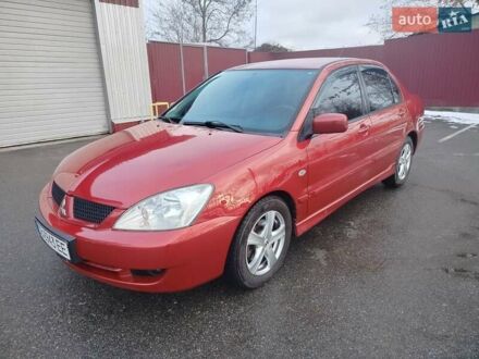 Червоний Міцубісі Lancer, об'ємом двигуна 1.6 л та пробігом 330 тис. км за 4350 $, фото 1 на Automoto.ua
