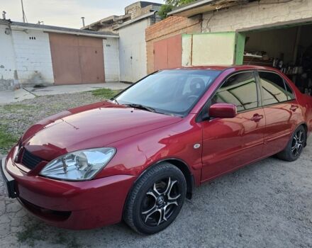 Червоний Міцубісі Lancer, об'ємом двигуна 1.6 л та пробігом 197 тис. км за 5900 $, фото 1 на Automoto.ua