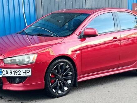 Червоний Міцубісі Lancer, об'ємом двигуна 2 л та пробігом 384 тис. км за 4699 $, фото 1 на Automoto.ua