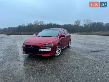 Красный Мицубиси Лансер, объемом двигателя 1.5 л и пробегом 241 тыс. км за 5850 $, фото 1 на Automoto.ua