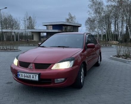 Червоний Міцубісі Lancer, об'ємом двигуна 1.6 л та пробігом 280 тис. км за 4650 $, фото 1 на Automoto.ua