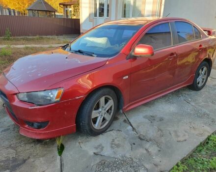 Красный Мицубиси Лансер, объемом двигателя 2 л и пробегом 406 тыс. км за 2750 $, фото 1 на Automoto.ua