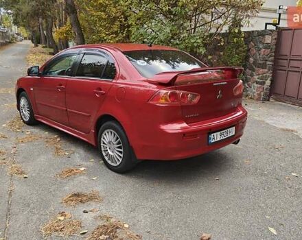Червоний Міцубісі Lancer, об'ємом двигуна 2 л та пробігом 187 тис. км за 5500 $, фото 1 на Automoto.ua