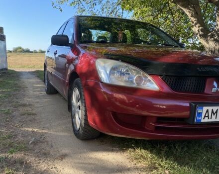 Червоний Міцубісі Lancer, об'ємом двигуна 1.6 л та пробігом 277 тис. км за 3700 $, фото 1 на Automoto.ua