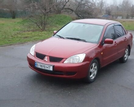 Красный Мицубиси Лансер, объемом двигателя 1.6 л и пробегом 250 тыс. км за 3700 $, фото 1 на Automoto.ua
