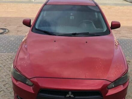 Красный Мицубиси Лансер, объемом двигателя 2 л и пробегом 198 тыс. км за 5700 $, фото 1 на Automoto.ua