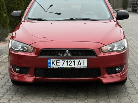 Червоний Міцубісі Lancer, об'ємом двигуна 2 л та пробігом 261 тис. км за 7200 $, фото 1 на Automoto.ua