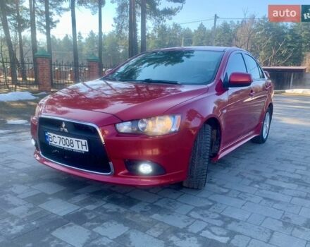 Червоний Міцубісі Lancer, об'ємом двигуна 2 л та пробігом 243 тис. км за 6000 $, фото 1 на Automoto.ua
