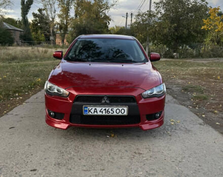 Червоний Міцубісі Lancer, об'ємом двигуна 2 л та пробігом 191 тис. км за 7200 $, фото 1 на Automoto.ua