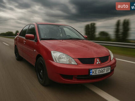 Міцубісі Lancer 2007 у Першотравенске на Automoto.ua Червоний Міцубісі Lancer, об'ємом двигуна 1.6 л та пробігом 210 тис. км за 4200 $, фото 1 на Automoto.ua