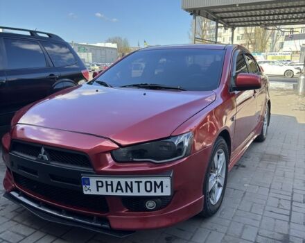Червоний Міцубісі Lancer, об'ємом двигуна 2 л та пробігом 267 тис. км за 7000 $, фото 1 на Automoto.ua