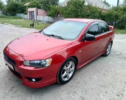 Червоний Міцубісі Lancer, об'ємом двигуна 2 л та пробігом 259 тис. км за 6500 $, фото 1 на Automoto.ua