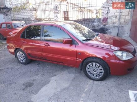 Мицубиси Лансер 2007 в Николаеве на Automoto.ua Красный Мицубиси Лансер, объемом двигателя 1.6 л и пробегом 237 тыс. км за 6500 $, фото 1 на Automoto.ua