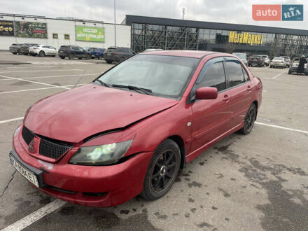 Красный Мицубиси Лансер, объемом двигателя 1.58 л и пробегом 290 тыс. км за 2750 $, фото 1 на Automoto.ua