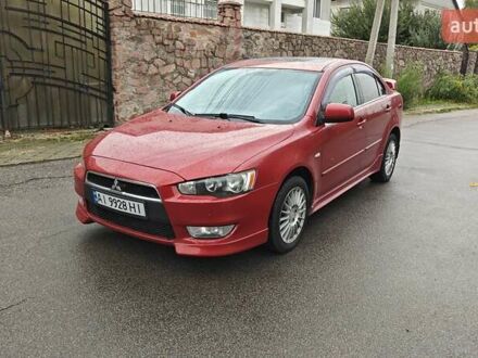 Червоний Міцубісі Lancer, об'ємом двигуна 2 л та пробігом 186 тис. км за 5600 $, фото 1 на Automoto.ua