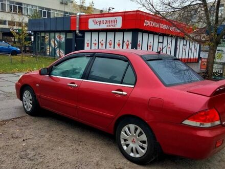 Міцубісі Lancer 2007 у Києві на Automoto.ua Червоний Міцубісі Lancer, об'ємом двигуна 16 л та пробігом 218 тис. км за 5000 $, фото 1 на Automoto.ua