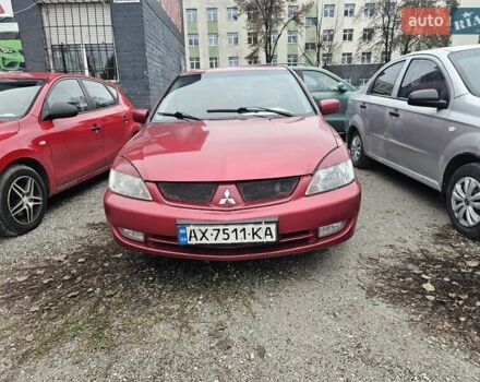 Червоний Міцубісі Lancer, об'ємом двигуна 1.6 л та пробігом 267 тис. км за 2999 $, фото 1 на Automoto.ua
