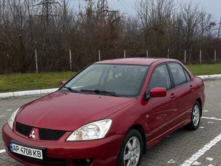 Червоний Міцубісі Lancer, об'ємом двигуна 1.6 л та пробігом 176 тис. км за 4300 $, фото 1 на Automoto.ua