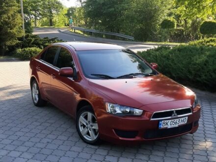 Червоний Міцубісі Lancer, об'ємом двигуна 2 л та пробігом 192 тис. км за 5999 $, фото 1 на Automoto.ua