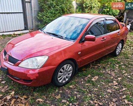 Червоний Міцубісі Lancer, об'ємом двигуна 1.6 л та пробігом 214 тис. км за 5000 $, фото 1 на Automoto.ua